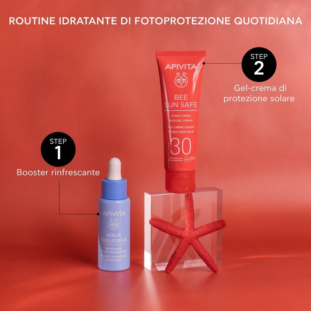 APIVITA Bee Sun Safe SPF 30 e una fiala booster presentati come routine idratante quotidiana.