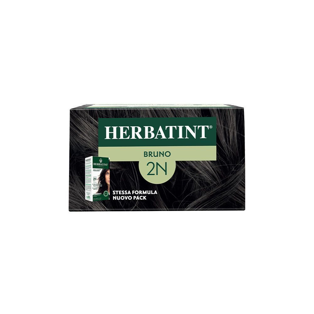 Tinta per capelli Herbatint, tonalità 2N Bruno, su sfondo di capelli scuri.