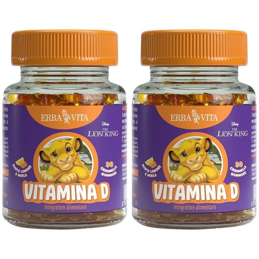 Due barattoli di caramelle gommose Vitamina D con Simba. Tappi arancioni, etichette viola.