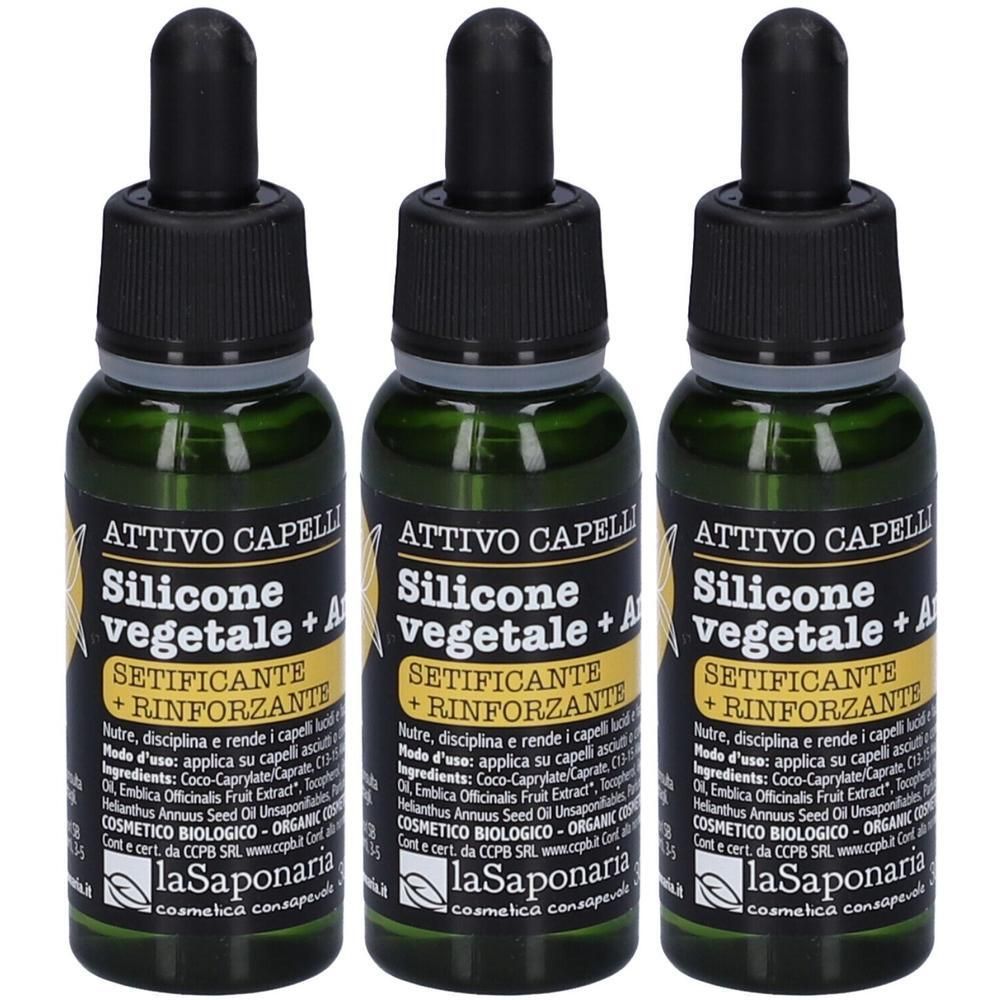 Tre flaconi contagocce verdi con tappo nero e pipetta. L'etichetta riporta 'Attivo Capelli Silicone Vegetale + Amla'.