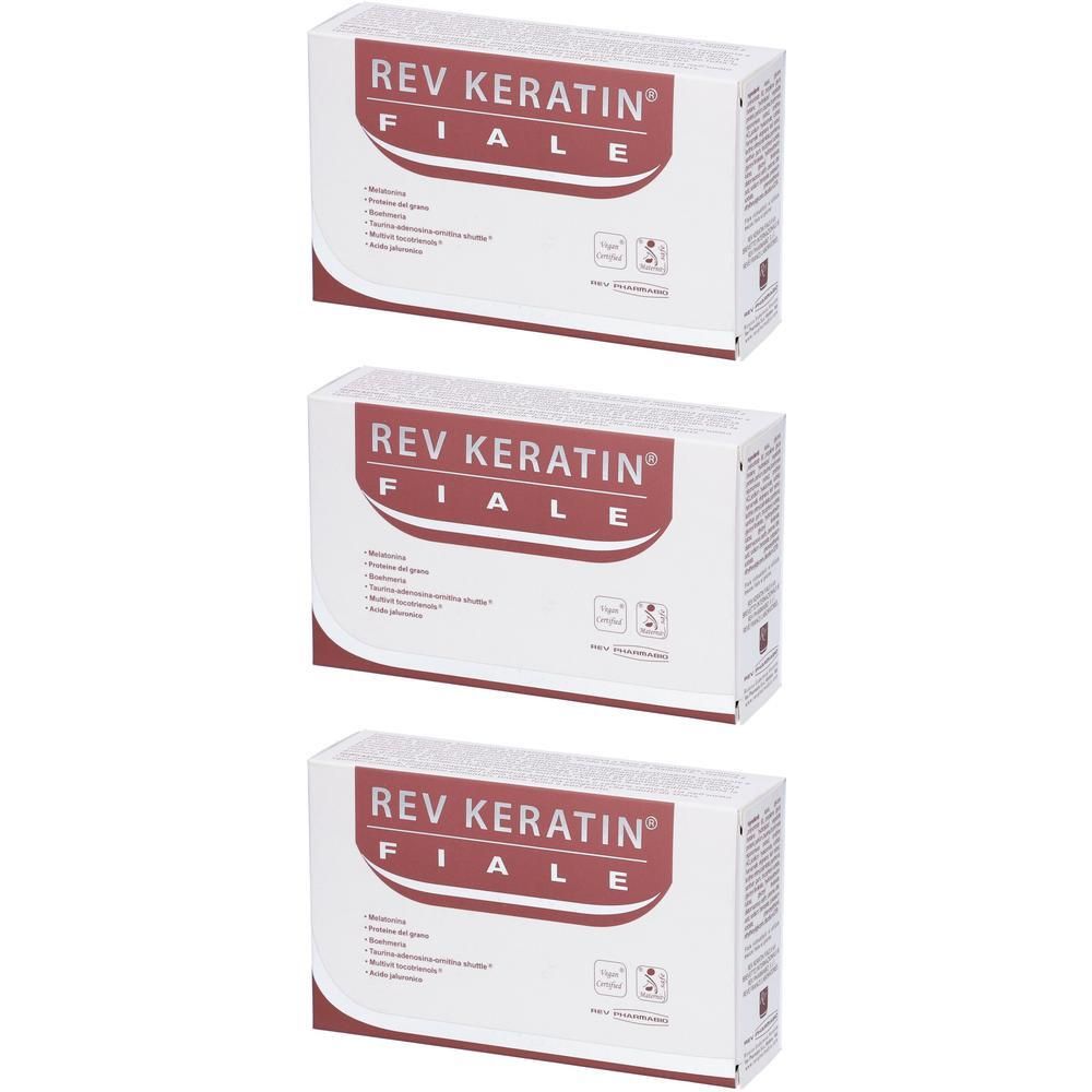 Tre scatole Rev Keratin Fiale, bianche con logo e testo rossi.