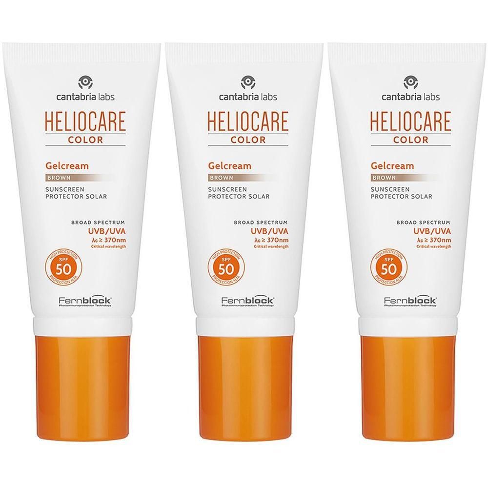 Tre tubetti di Heliocare Color Gelcream Brown SPF 50. Tubetti bianchi con tappo arancione.