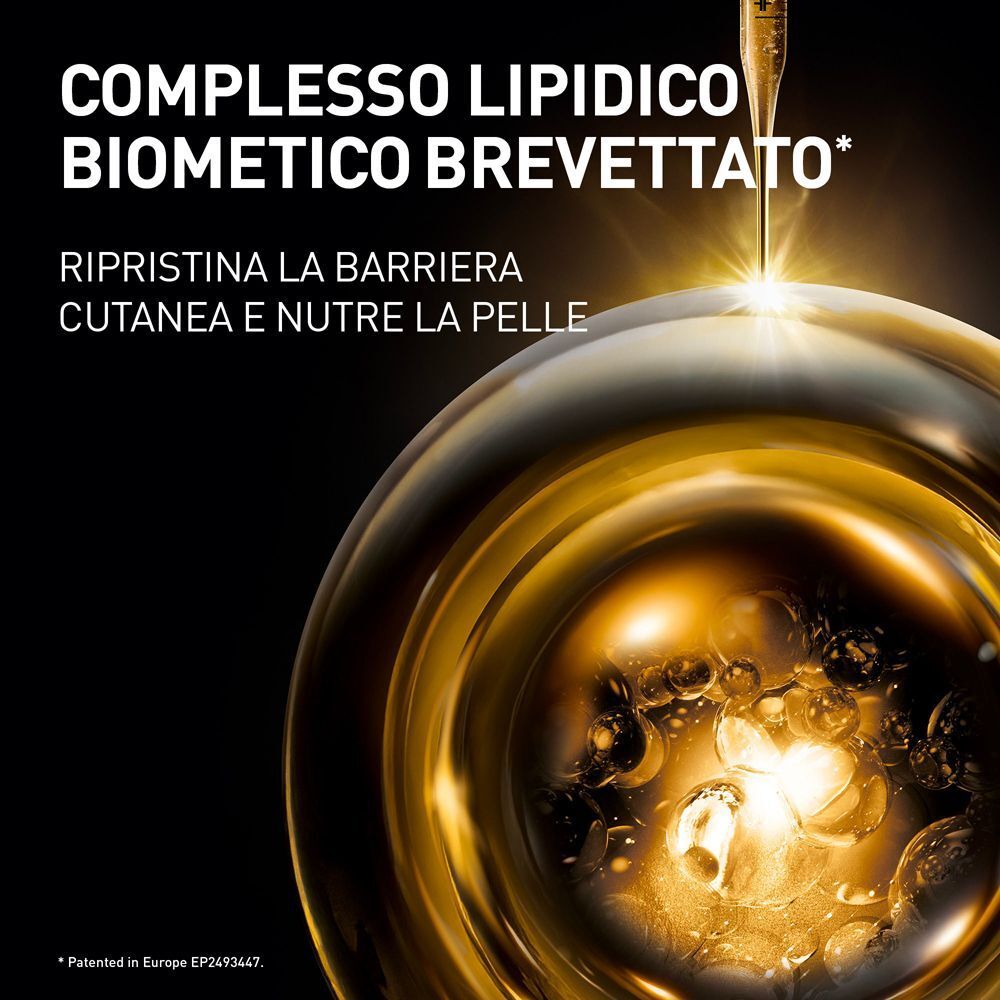 Goccia di un siero dorato che ripristina la barriera cutanea.
