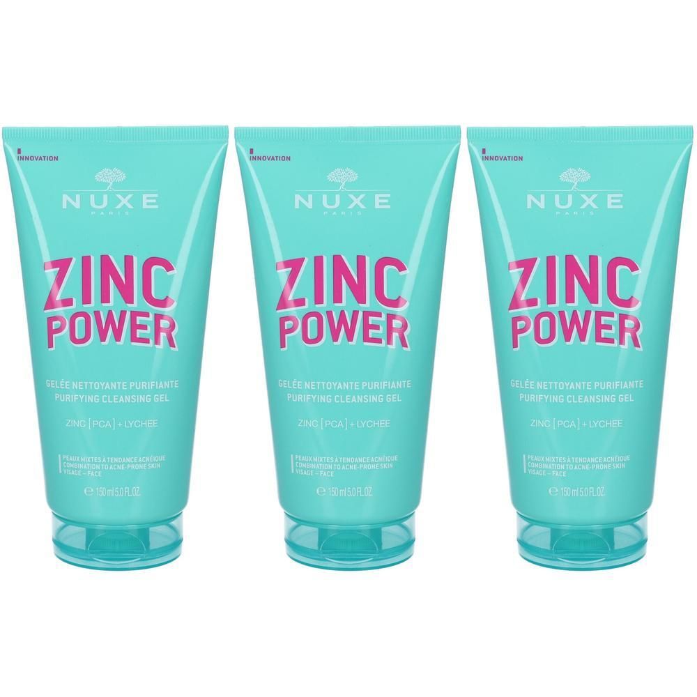 Tre tubi di gel detergente Nuxe Zinc Power, turchesi con scritte rosa.