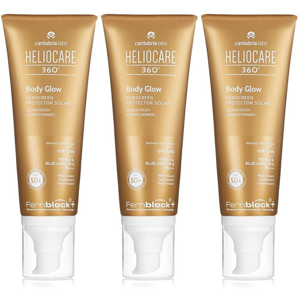Tre tubi dorati Heliocare 360° Body Glow Sunscreen SPF50+ con dispenser a pompa.