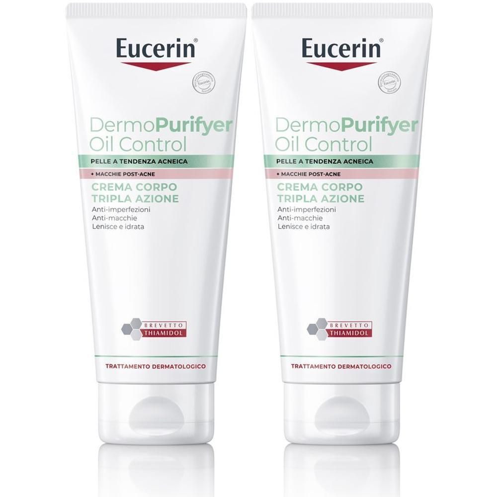 Due tubetti di crema Eucerin DermoPurifyer Oil Control con tappo bianco ed etichetta.