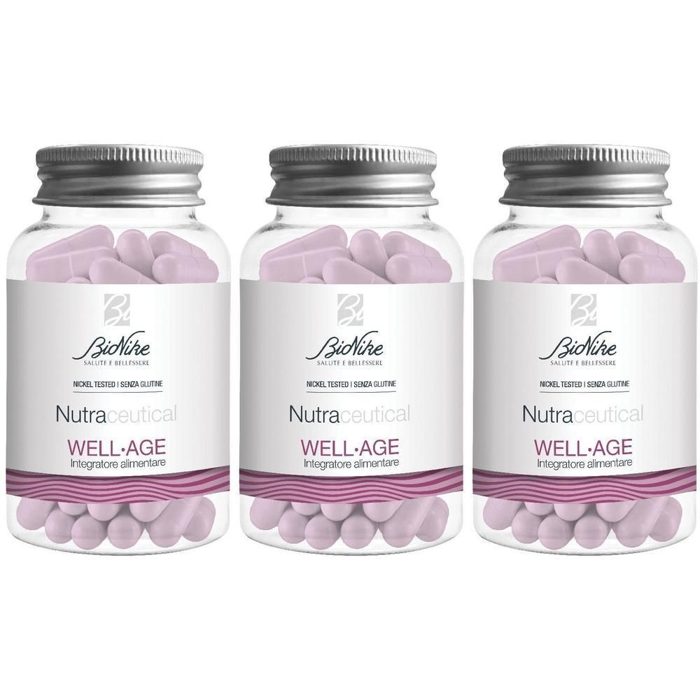 Tre flaconi di capsule BioNike Nutrapeutical Well-Age, riempiti con capsule viola chiaro.