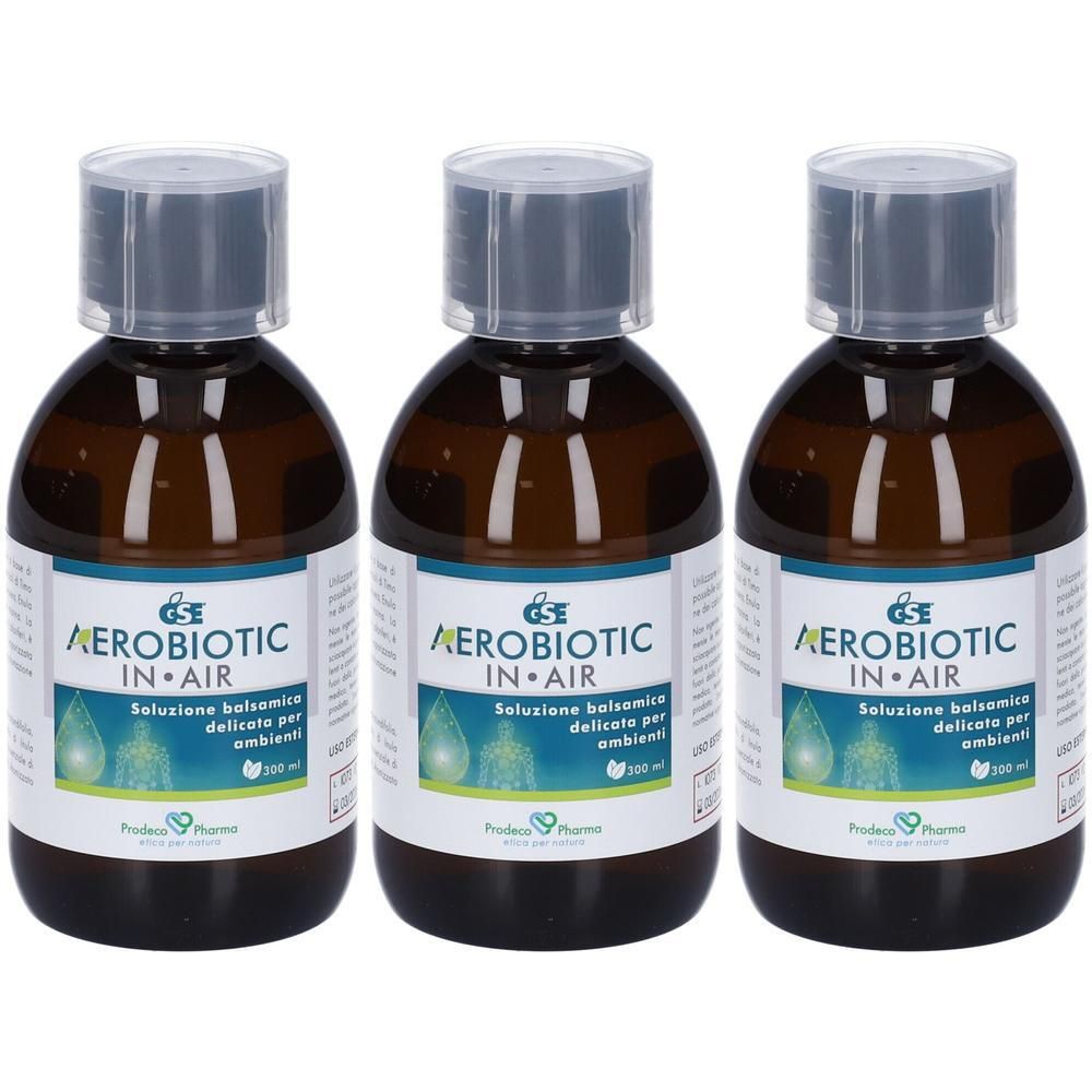 Tre flaconi in vetro ambrato con liquido trasparente e tappo grigio. Etichetta indica "AEROBIOTIC IN AIR".