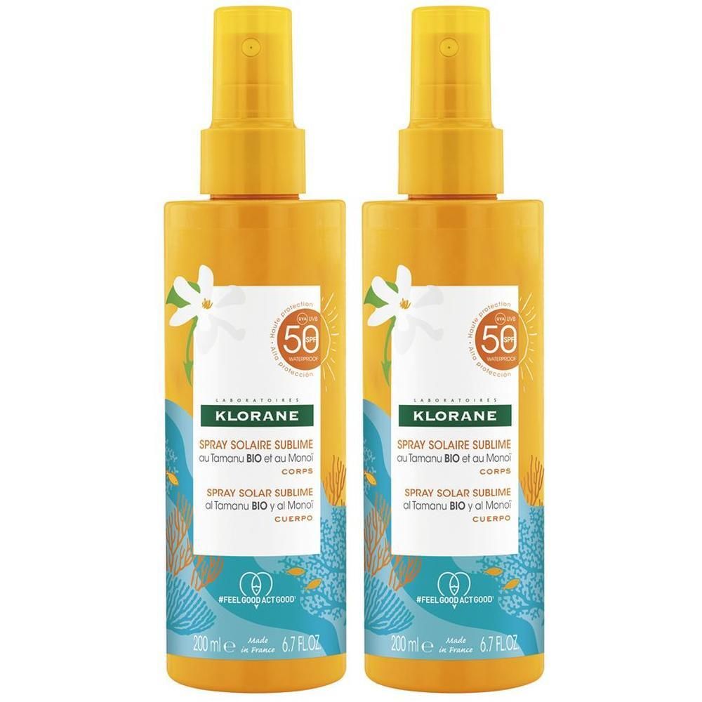 Due spray solari Klorane SPF 50 al Monoï. Flaconi gialli con etichetta bianca e motivo floreale.