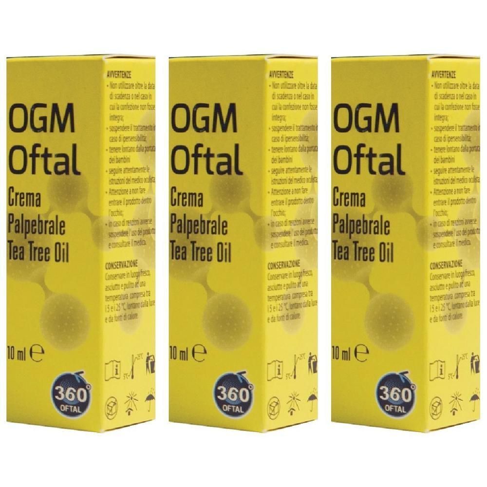 Tre confezioni di OGM Oftal Crema Palpebrale Tea Tree Oil. Scatole gialle con informazioni sul prodotto e simboli.