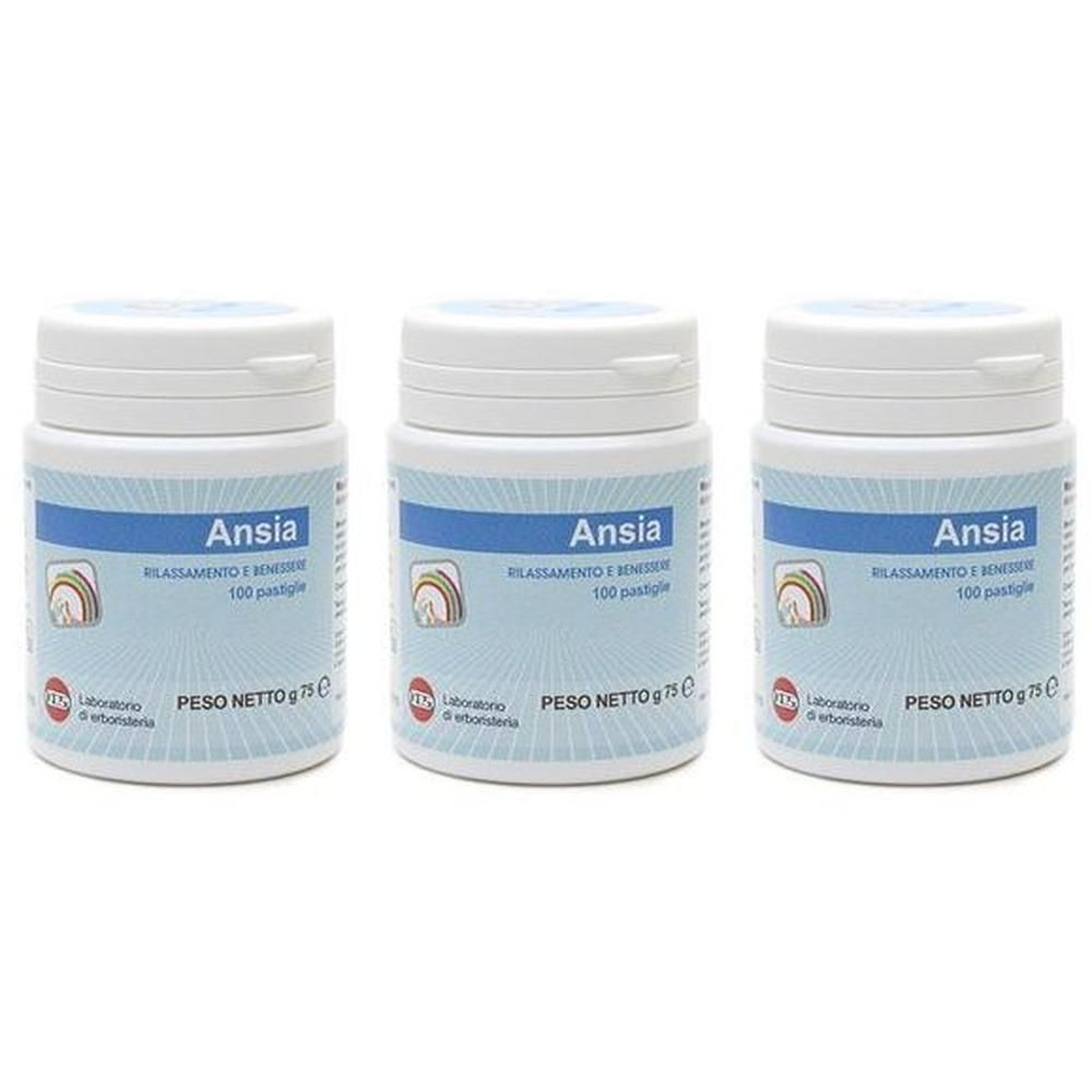 Tre contenitori bianchi con etichette blu che indicano 'Anxia' e '100 Pastiglie'.