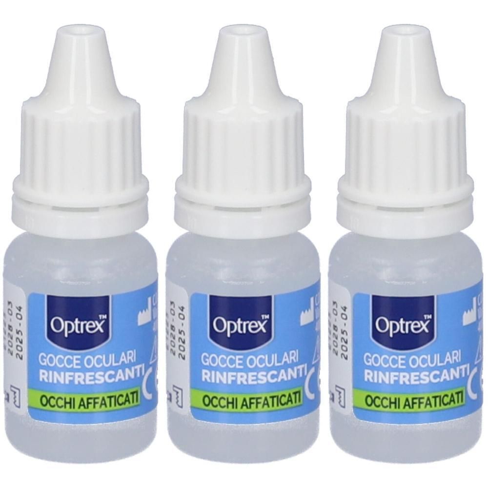 Tre piccole bottiglie di Optrex Gocce Oculari Rinfrescanti con tappo bianco ed etichetta blu.