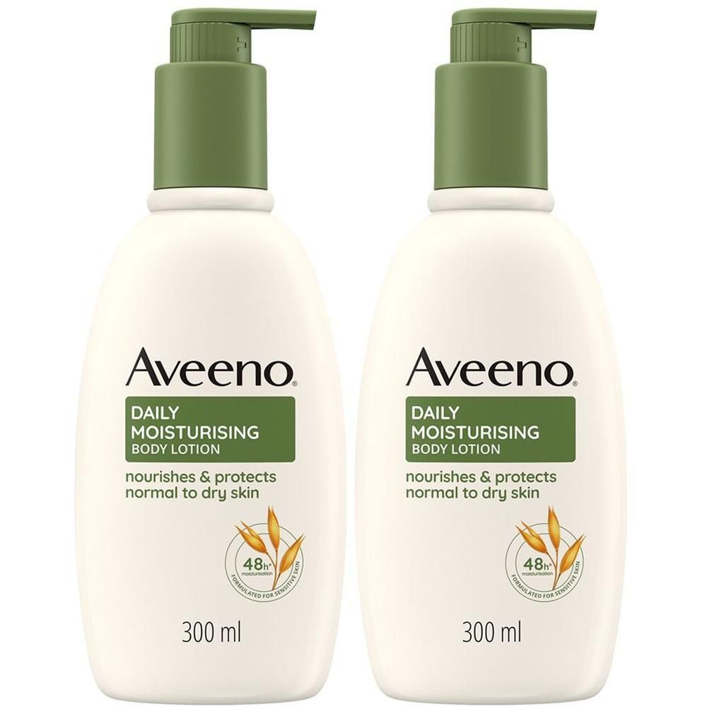 Due flaconi di lozione corpo idratante Aveeno con dispenser.