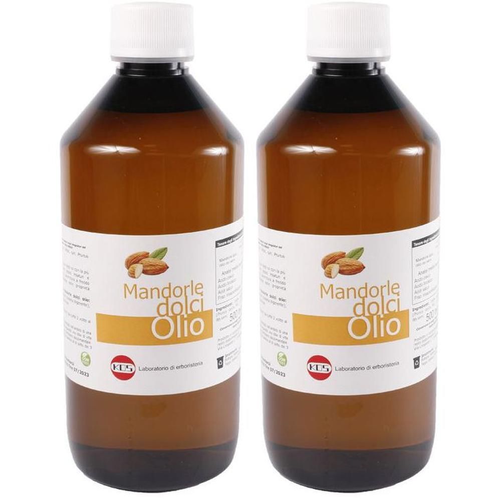 Due flaconi di olio di mandorle dolci. Flaconi in vetro ambrato con tappi ed etichette bianchi.