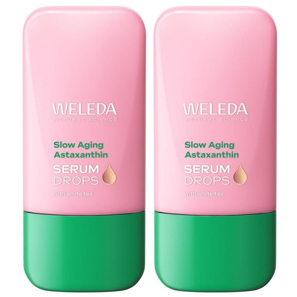 Due flaconi di siero Weleda Astaxanthin Drops, rosa e verde.