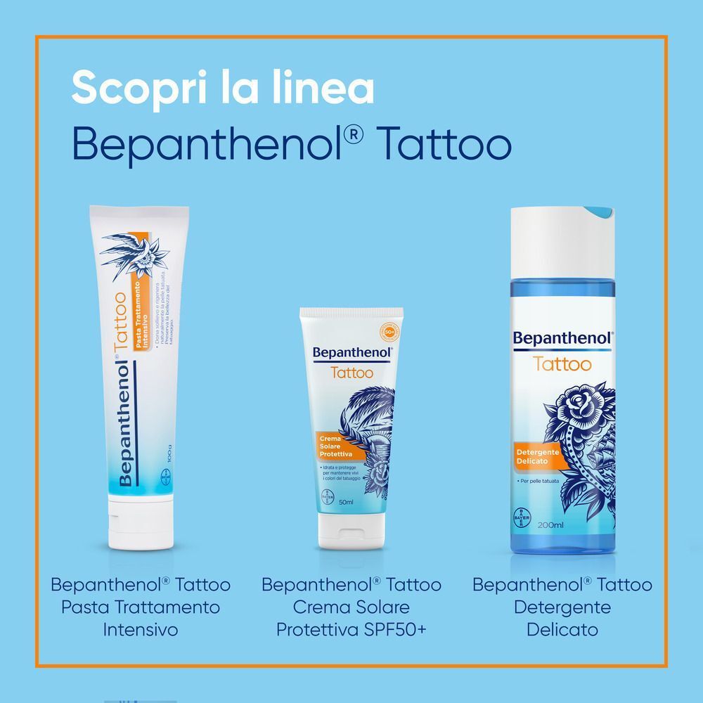 Pasta trattamento intensivo Bepanthenol Tattoo in tubo bianco con tappo blu e motivo tattoo.