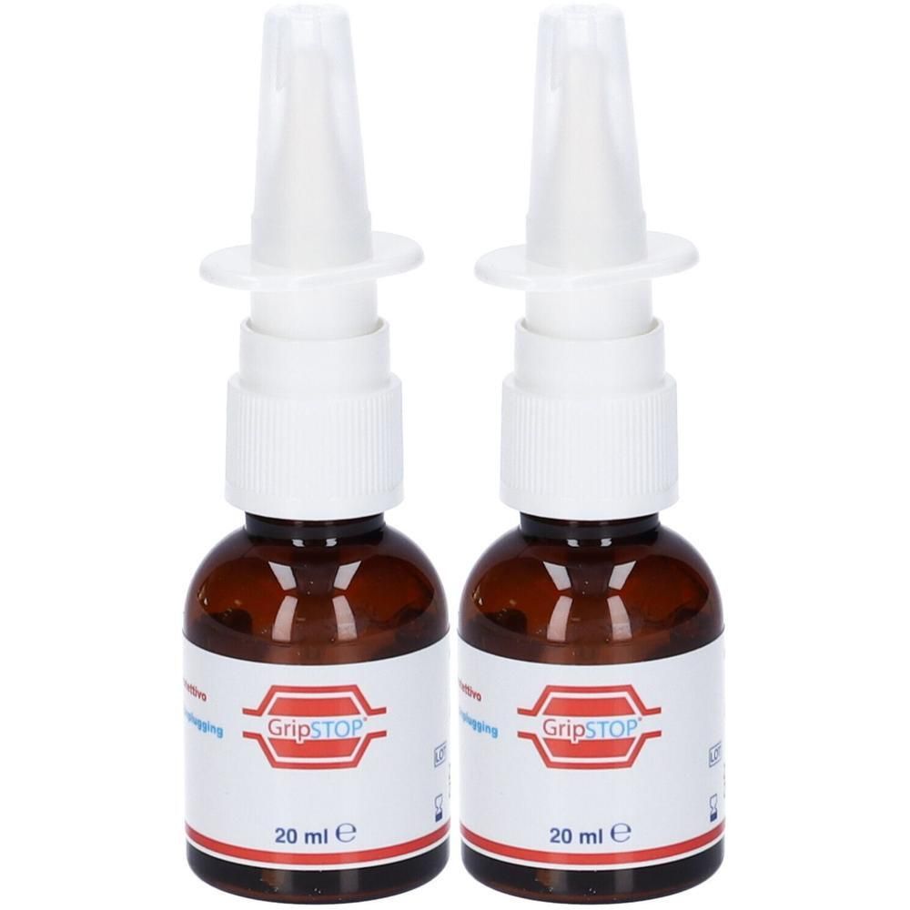 Due flaconi in vetro ambrato con applicatori spray nasale e tappi bianchi. Etichette mostrano 'GripSTOP' e '20 ml e'.