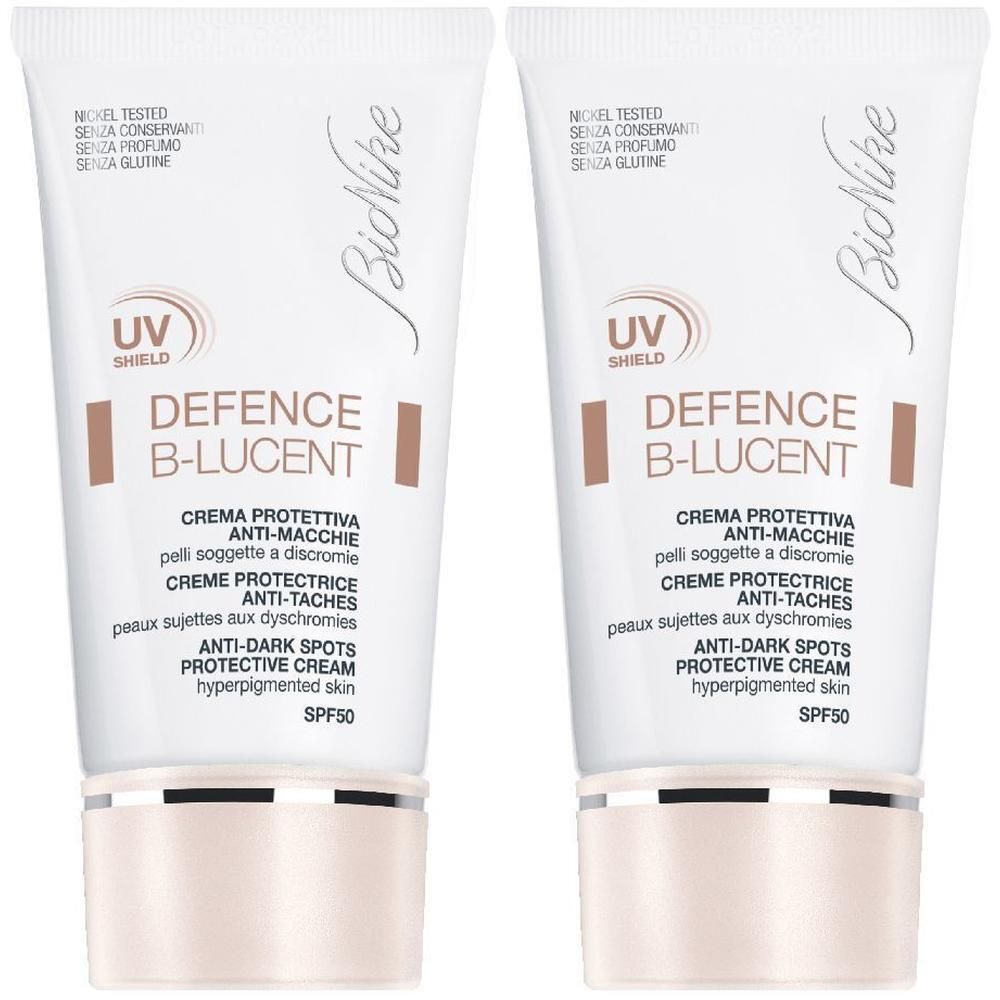 Due tubetti di crema BioNike Defence B-Lucent SPF 50 per pelli iperpigmentate.