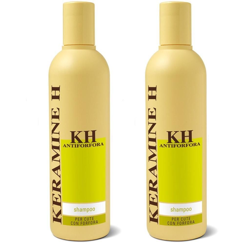 Due flaconi di shampoo gialli con etichetta verde e scritte nere.