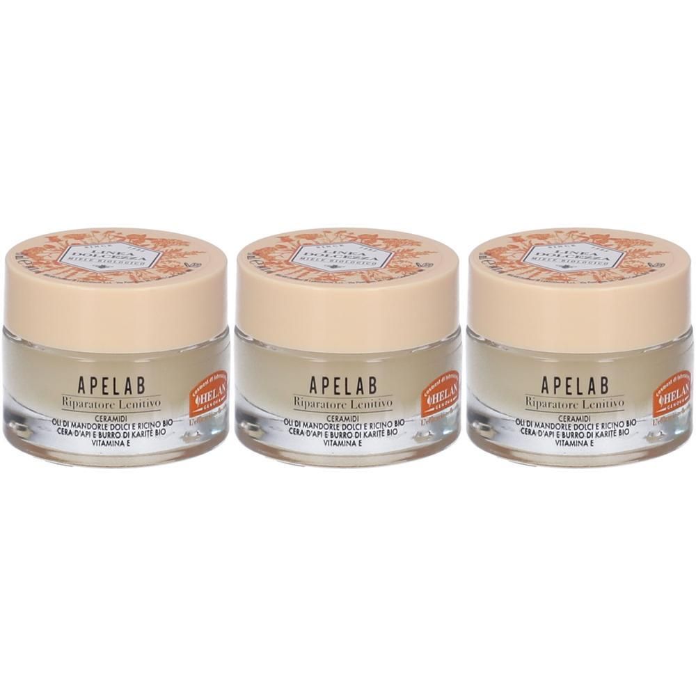 Tre vasetti di crema Apelab Riparatore Lenitivo. Contenitori in vetro con tappo beige ed etichetta.