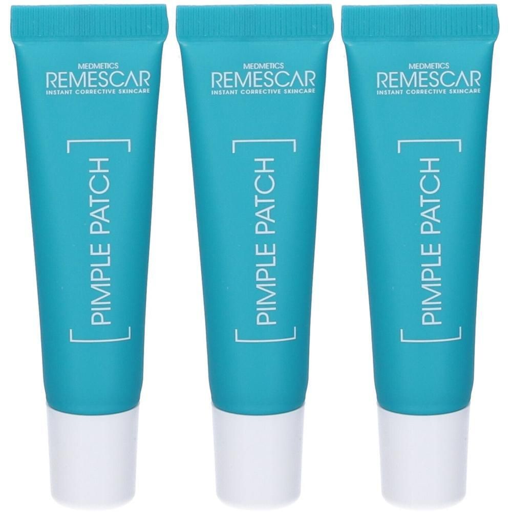 Tre tubetti turchesi con tappo bianco, etichettati Remescar Pimple Patch.