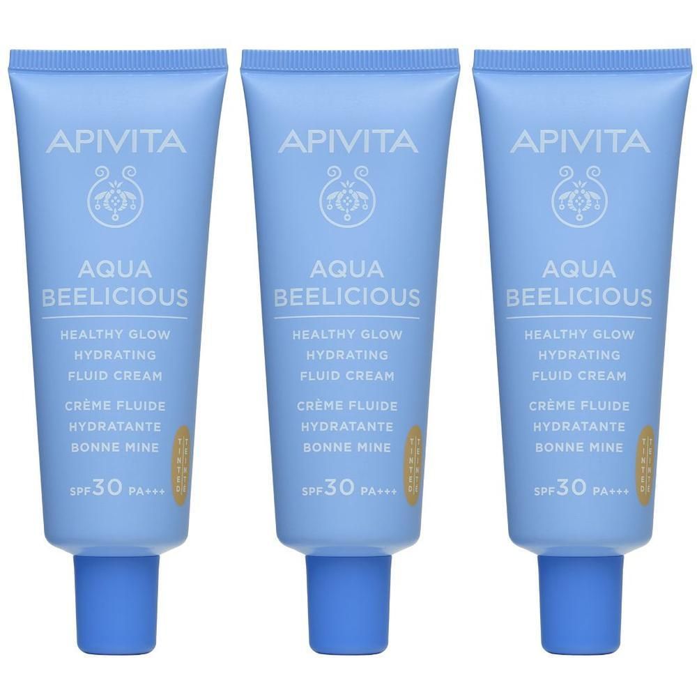 Tre tubetti blu Apivita Aqua Beelicious fluido idratante colorato SPF 30.