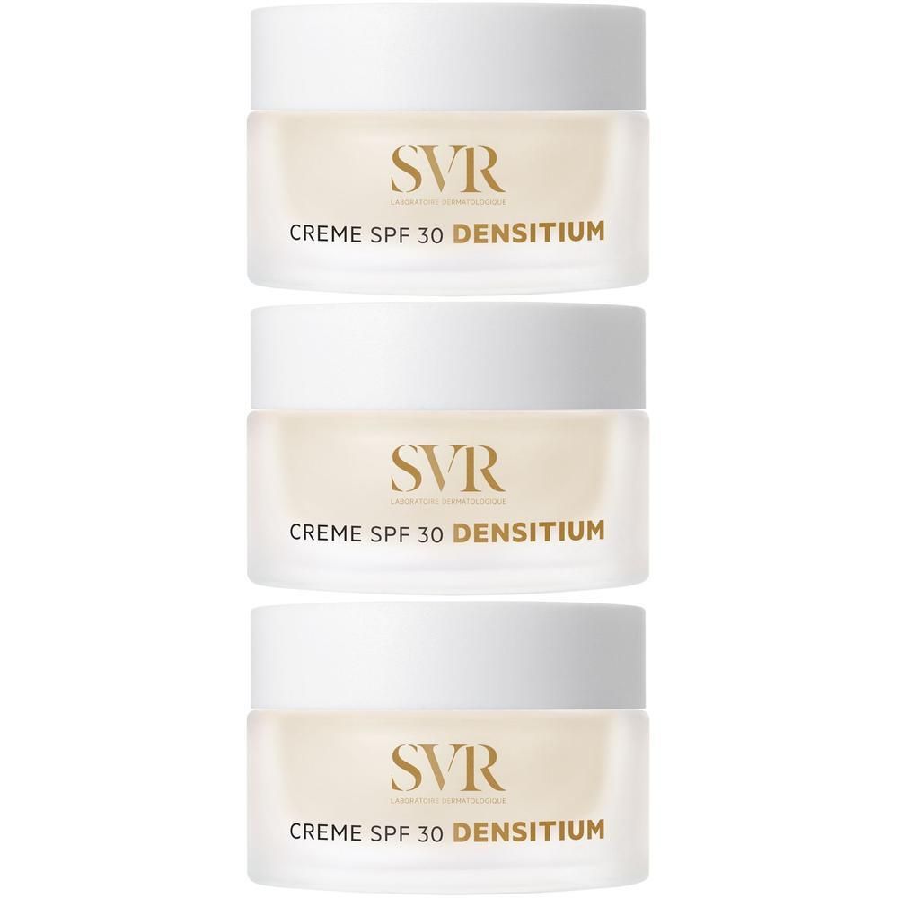 Tre barattoli di SVR Densitium Crema SPF30 impilati. Tappi bianchi, contenitori traslucidi con scritte dorate.