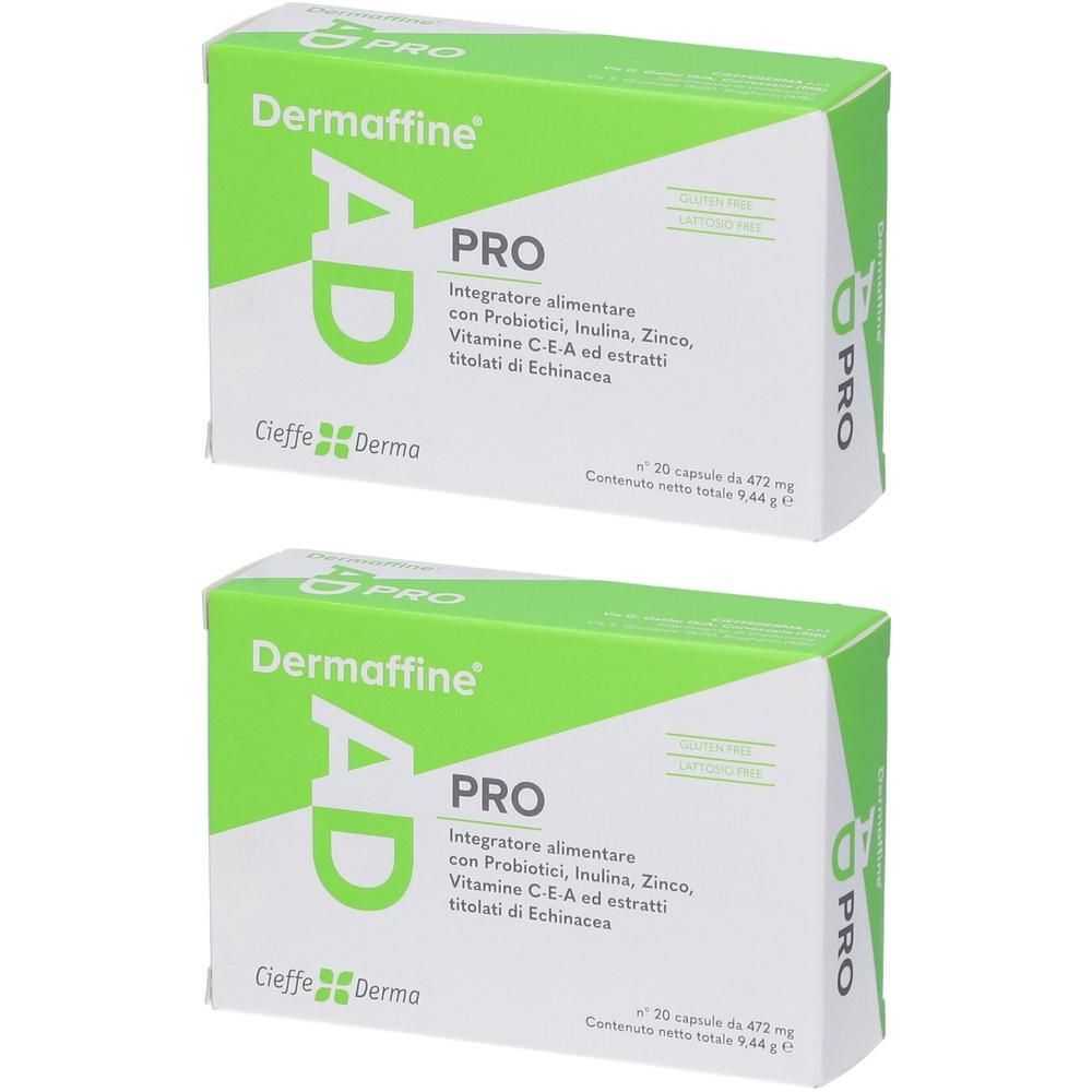 Due scatole di Dermaffine AD Pro Capsule, verdi e bianche.