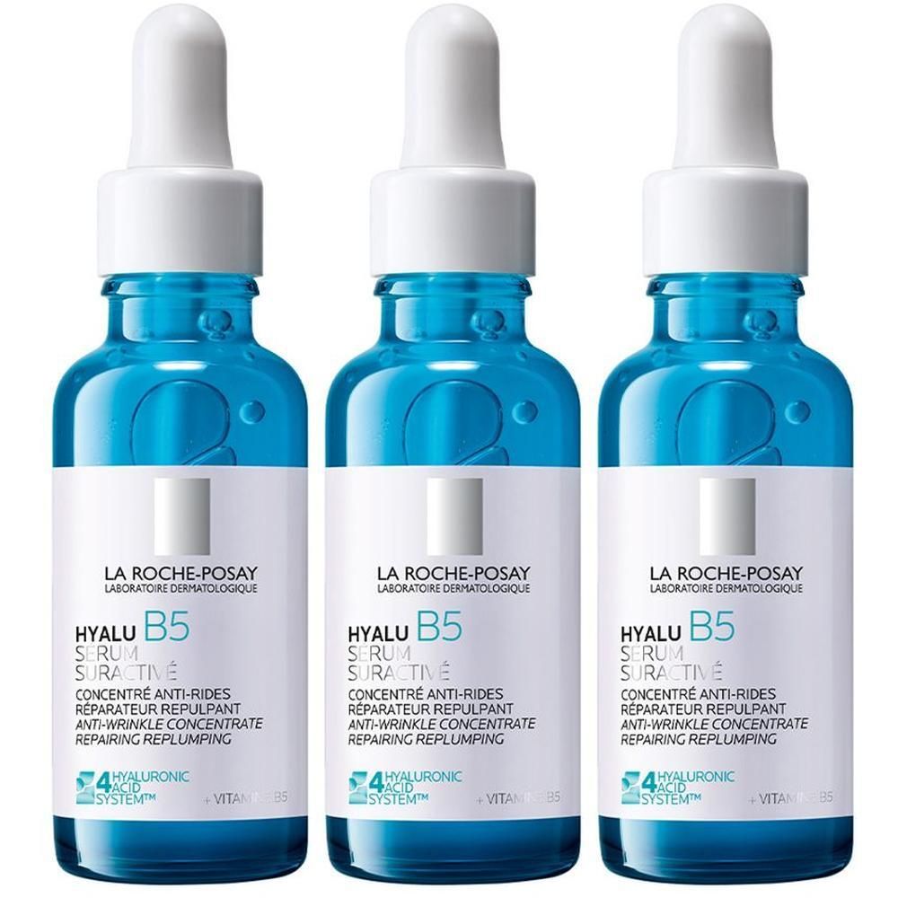 Tre flaconi di siero La Roche-Posay Hyalu B5 con contagocce.