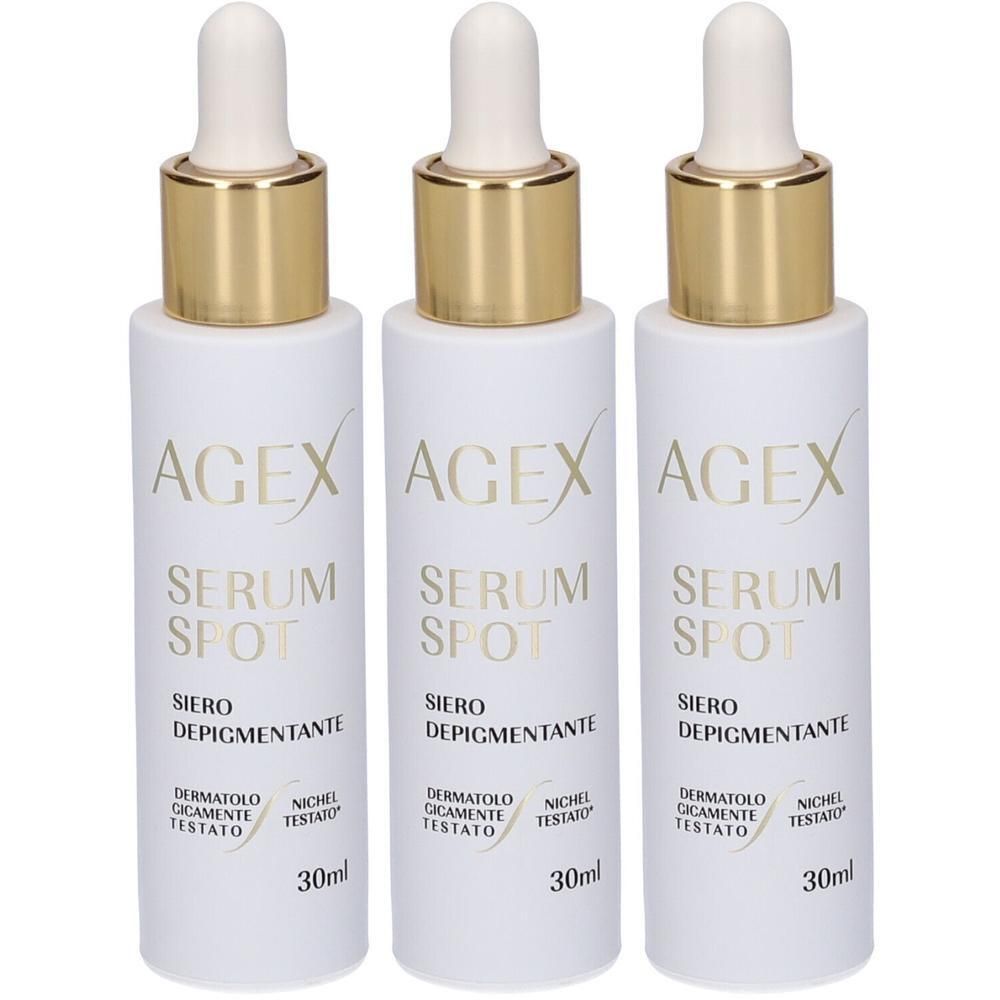 Tre flaconi bianchi con contagocce, tappo dorato e scritta 'AGEX SERUM SPOT'.