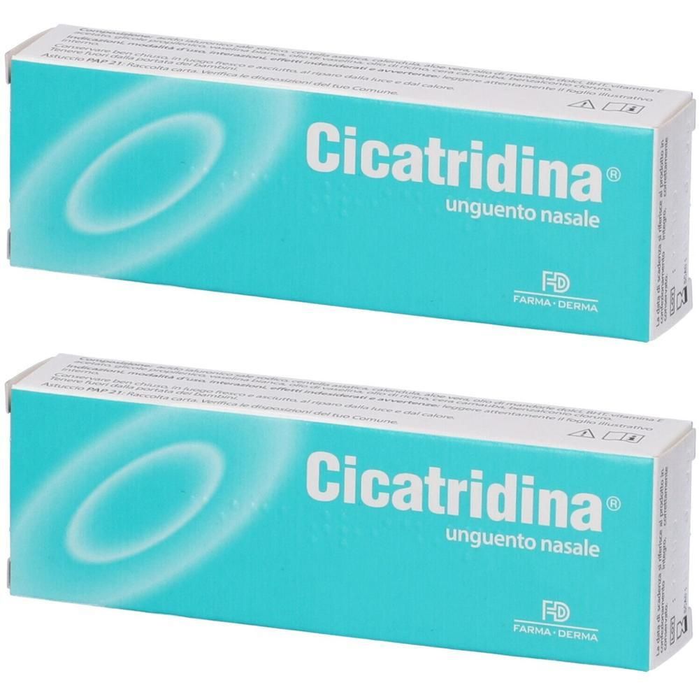 Due confezioni di Cicatridina unguento nasale con logo FD Farma-Derma su sfondo turchese.