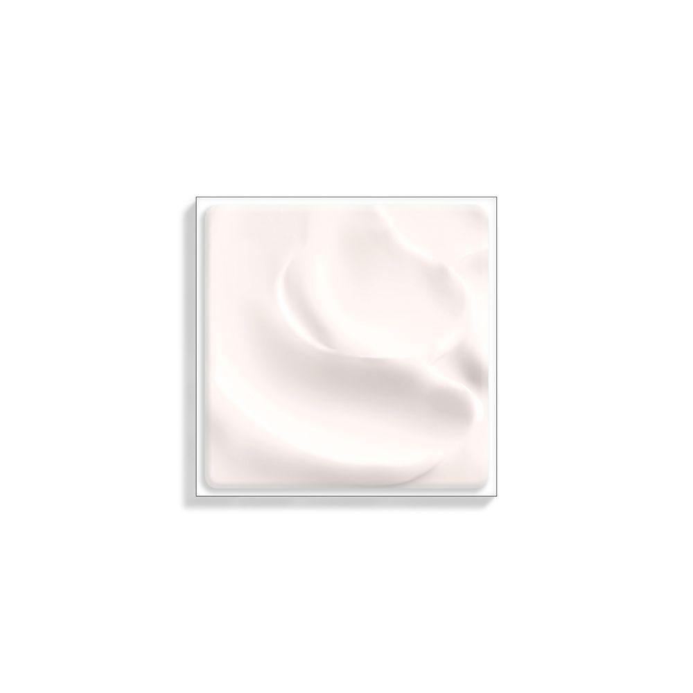 Una crema bianca e liscia in un contenitore quadrato.