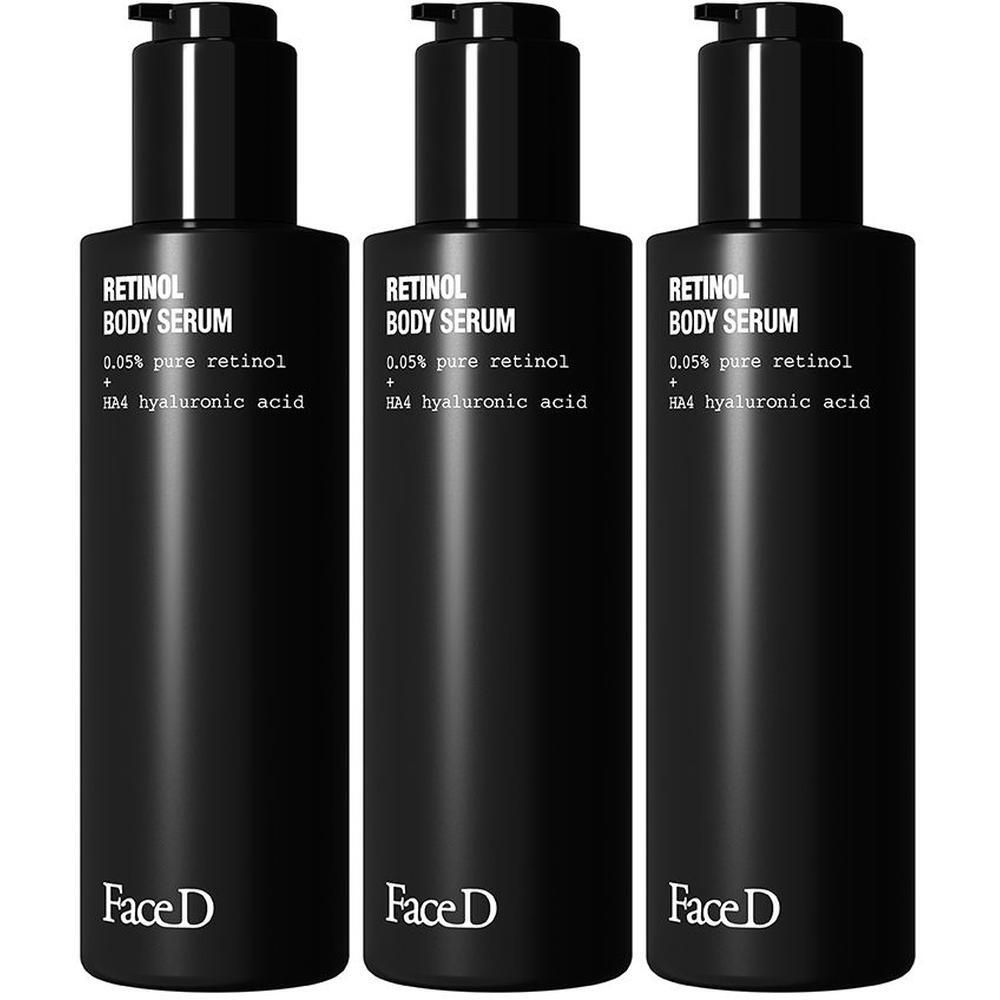 Tre flaconi neri Face D Retinol Body Serum con dispenser.