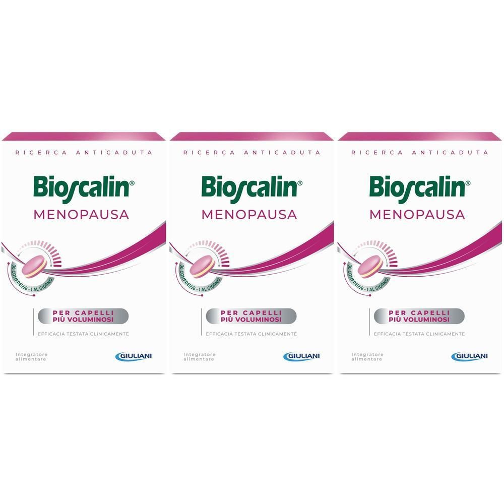Tre confezioni di compresse Bioscalin Menopausa, design rosa e bianco, focalizzate sulla salute dei capelli.