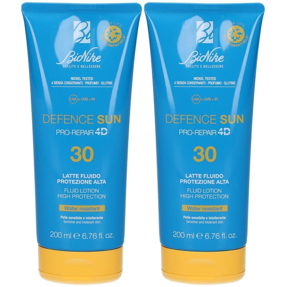 Due flaconi di Bionike Defence Sun 30 Latte Fluido, 200 ml.