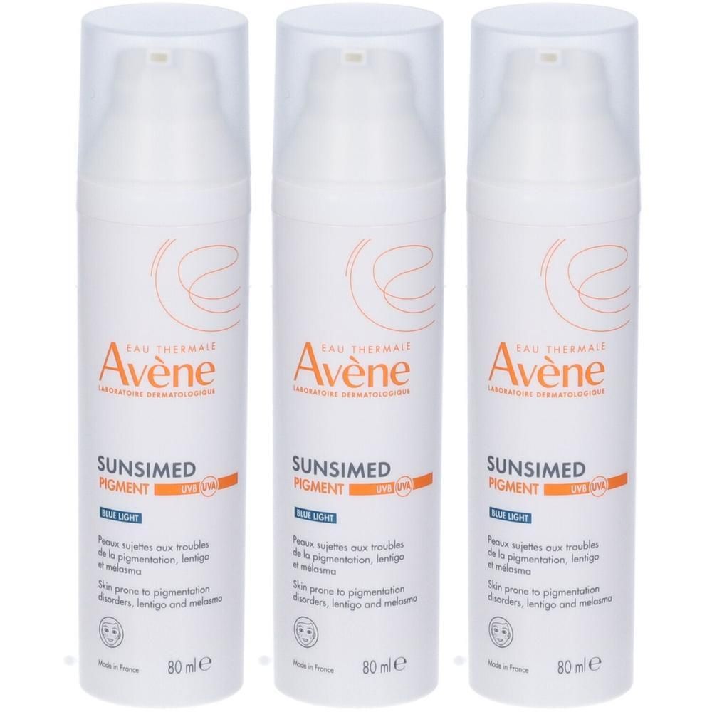 Tre flaconi Avène Sunsimed Pigment con tappo a pompa.