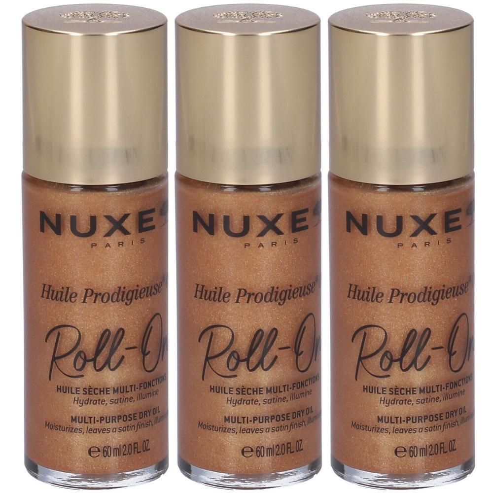 Tre flaconi Nuxe Huile Prodigieuse Or Roll-On con tappi dorati. Olio glitterato color bronzo.