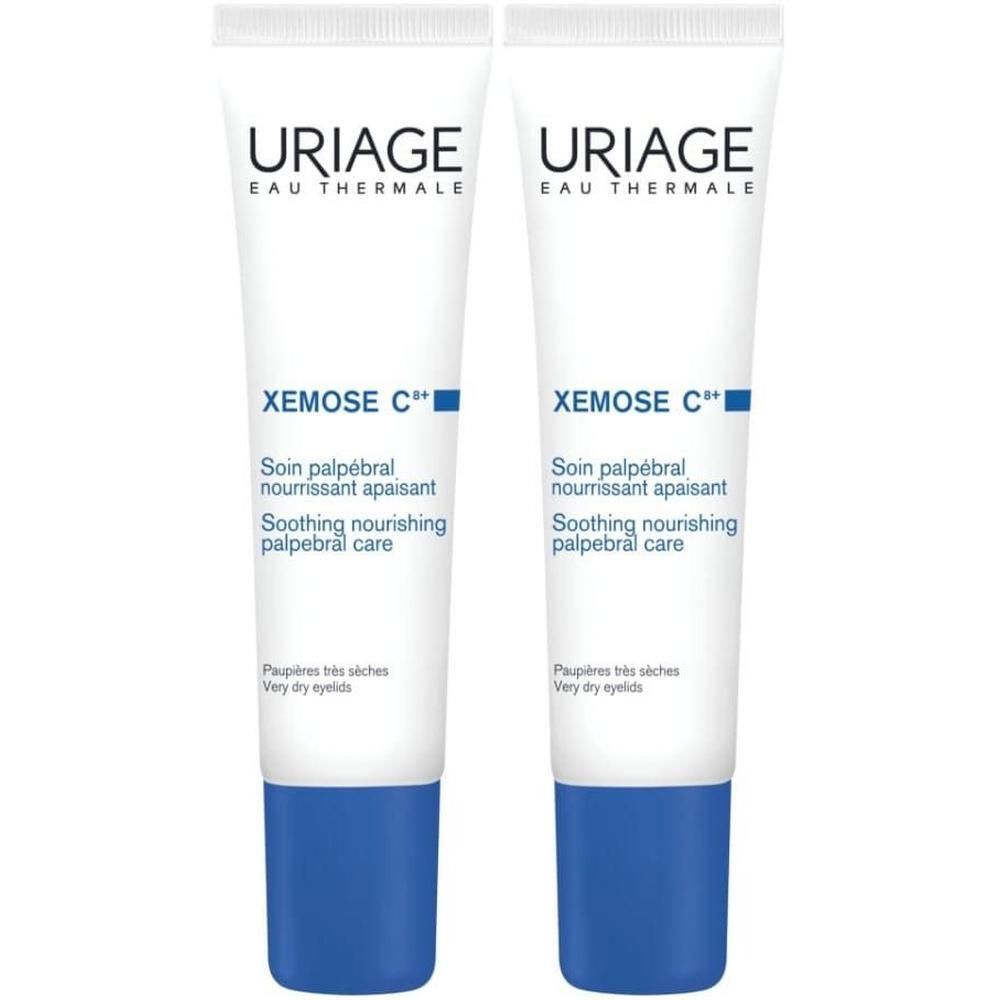 Due tubetti di trattamento palpebrale Uriage Xemose C++ con tappo blu.