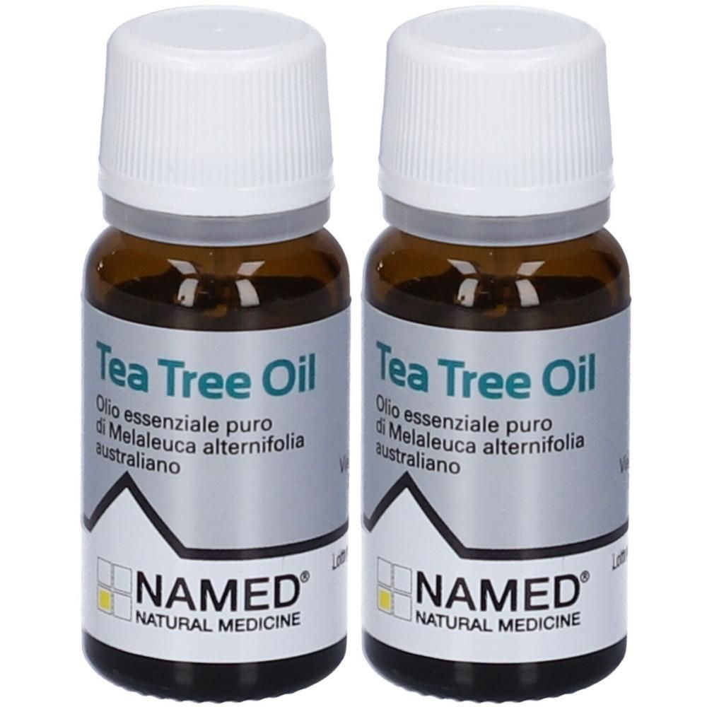 Due flaconi di Tea Tree Oil NAMED. Flaconi in vetro ambrato con tappo a vite bianco.