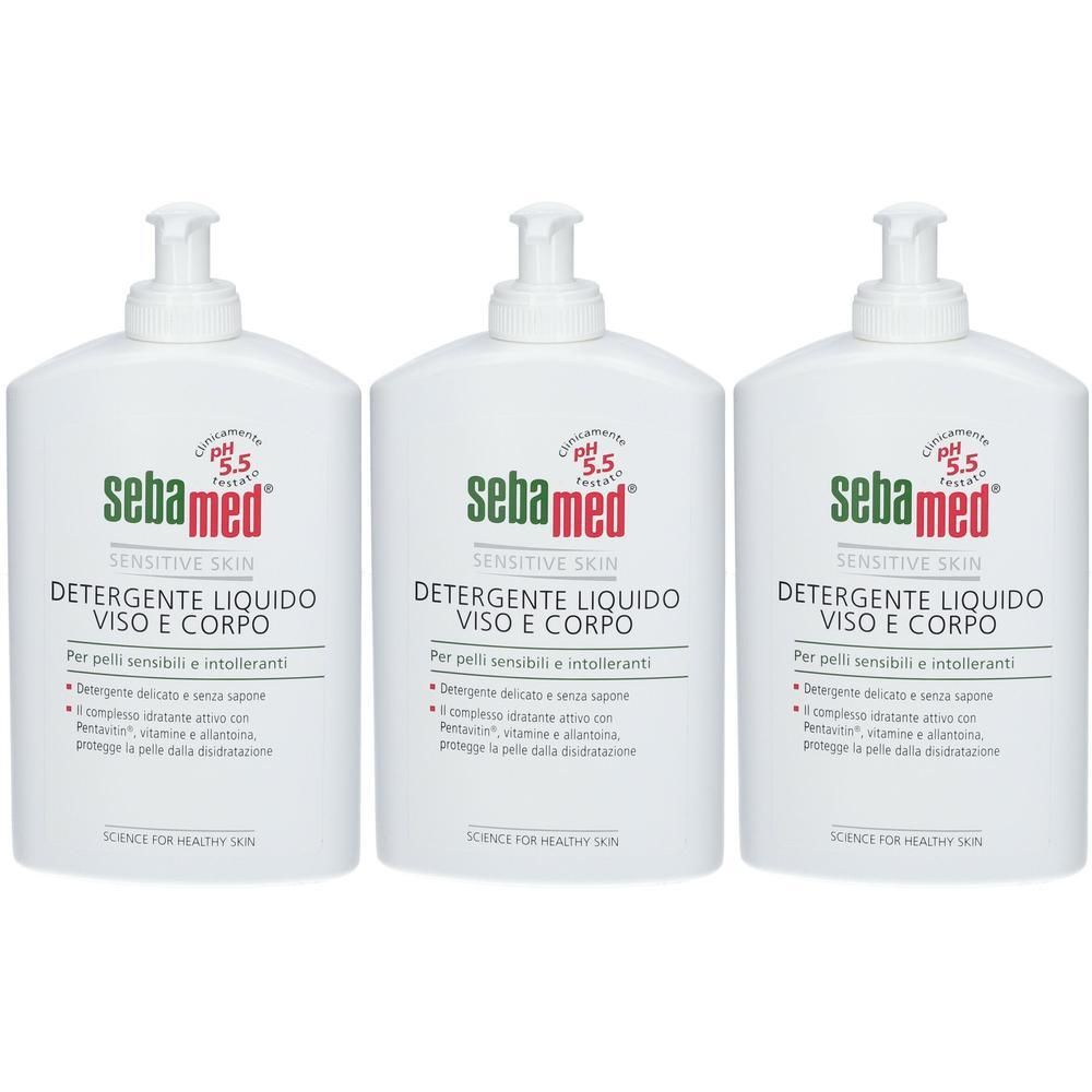 Tre flaconi con pompa bianchi di detergente liquido Sebamed per viso e corpo, pH 5.5.