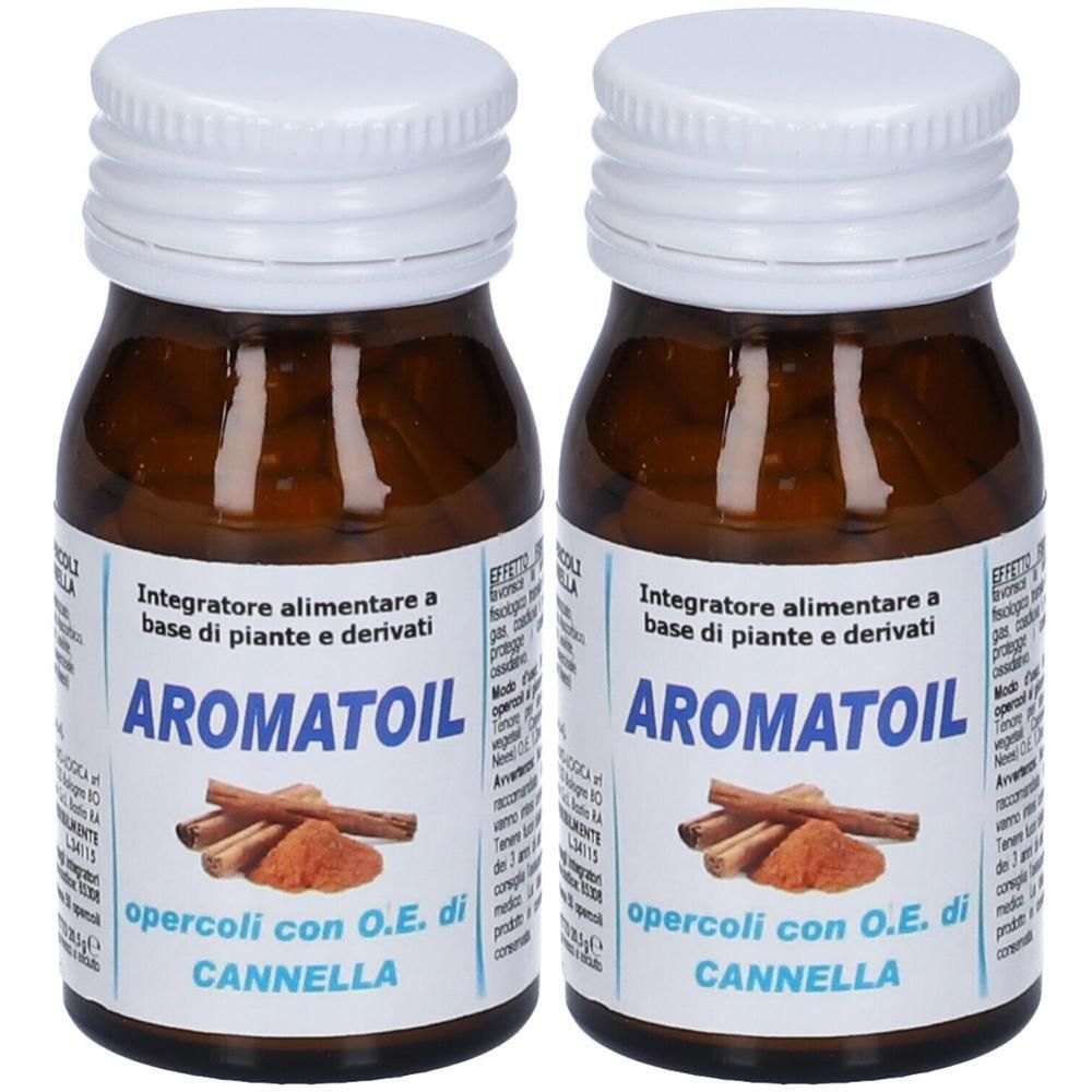 Due flaconcini di capsule alla cannella, vetro ambrato, tappi bianchi. Etichetta con stecche e polvere di cannella.