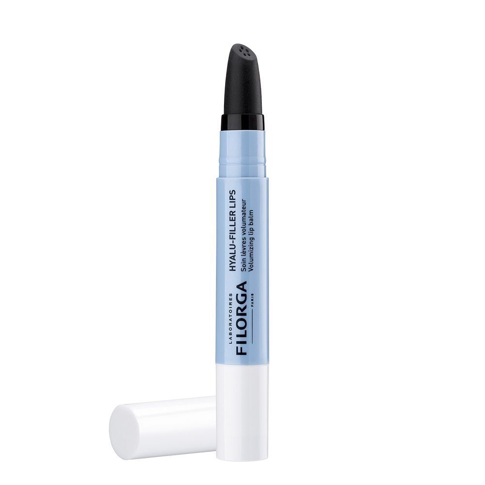 Una penna bianca per balsamo labbra, aperta, con applicatore nero e tappo bianco.