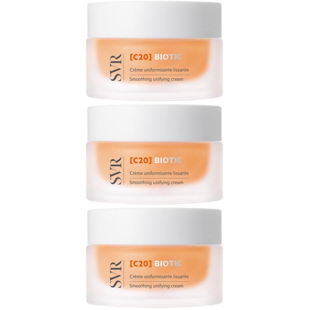 Tre vasetti di crema SVR C20 Biotic con tappo bianco e contenuto arancione.