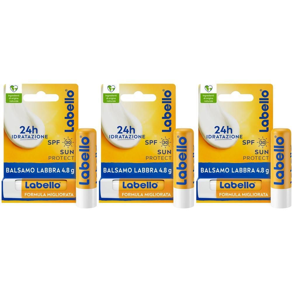 Tre stick di balsamo labbra Labello Sun Protect SPF30 in confezione gialla.