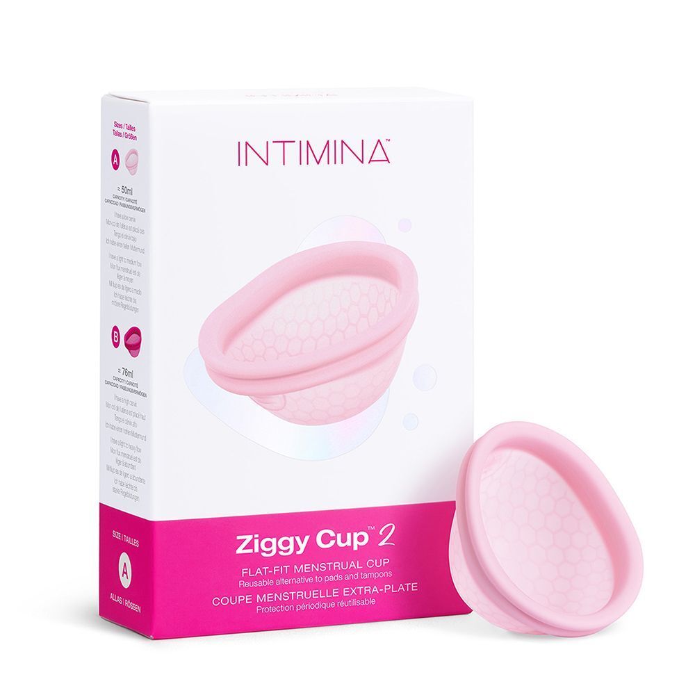 Coppetta mestruale rosa accanto alla sua confezione con nome 'Ziggy Cup 2'.