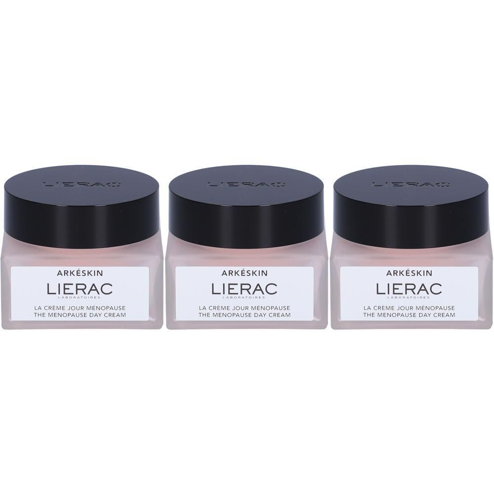 Tre barattoli di crema giorno Lierac Arkéskin con tappi neri e contenuto rosa.