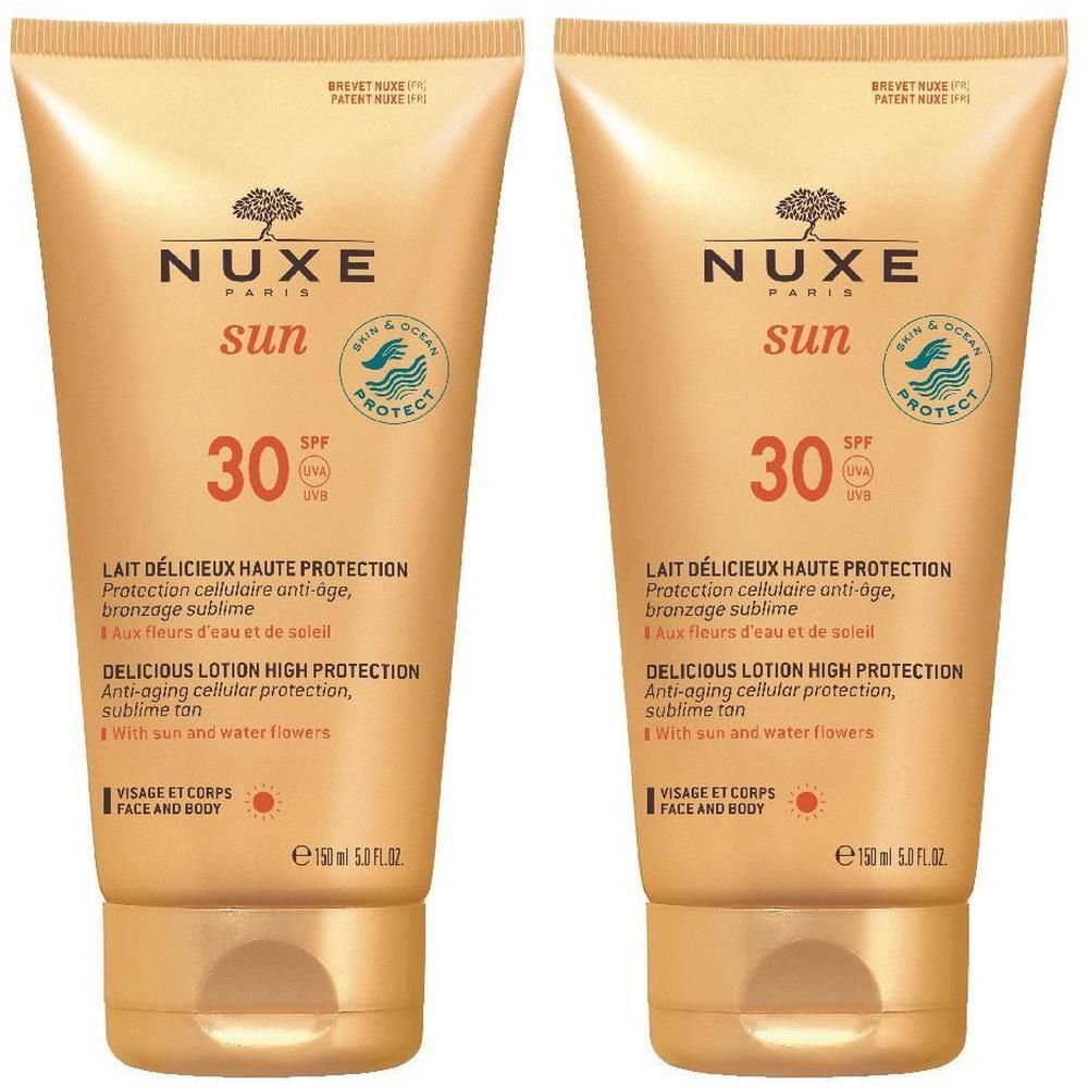 Due tubi dorati Nuxe Sun Latte Solare Viso E Corpo SPF 30, lozione solare per viso e corpo.