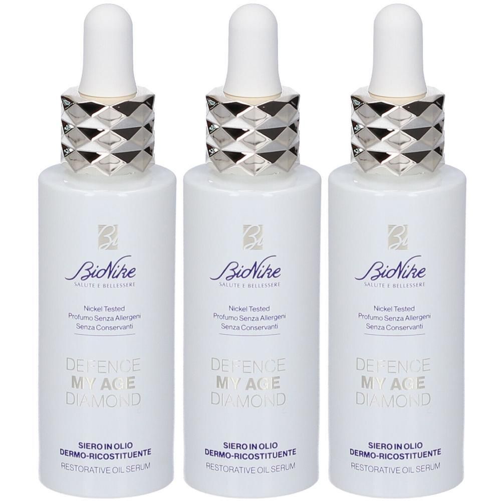 Tre flaconi bianchi Bionike Defence My Age Diamond con contagocce. Siero olio dermo-ricostituente.