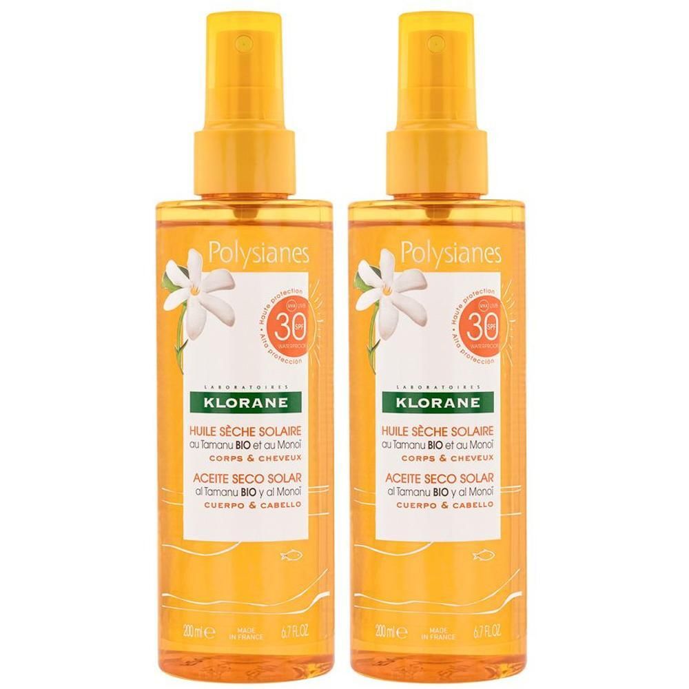 Due flaconi spray di olio solare Klorane SPF 30 con Tamanu BIO.