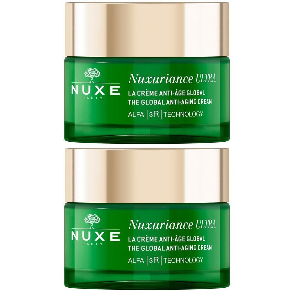 Due vasetti verdi Nuxe Nuxuriance Ultra con tappi dorati, uno accanto all'altro.